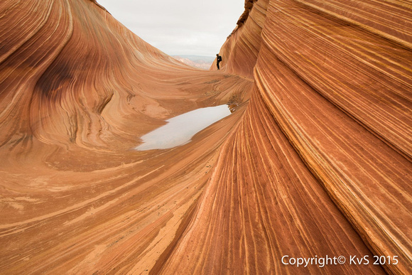 At ''The Wave''...The Wave is a sandstone rock formation located near the Arizona-Utah border, on the slopes of the Coyote Buttes, in the aria Canyon-Vermilion Cliffs Wilderness,